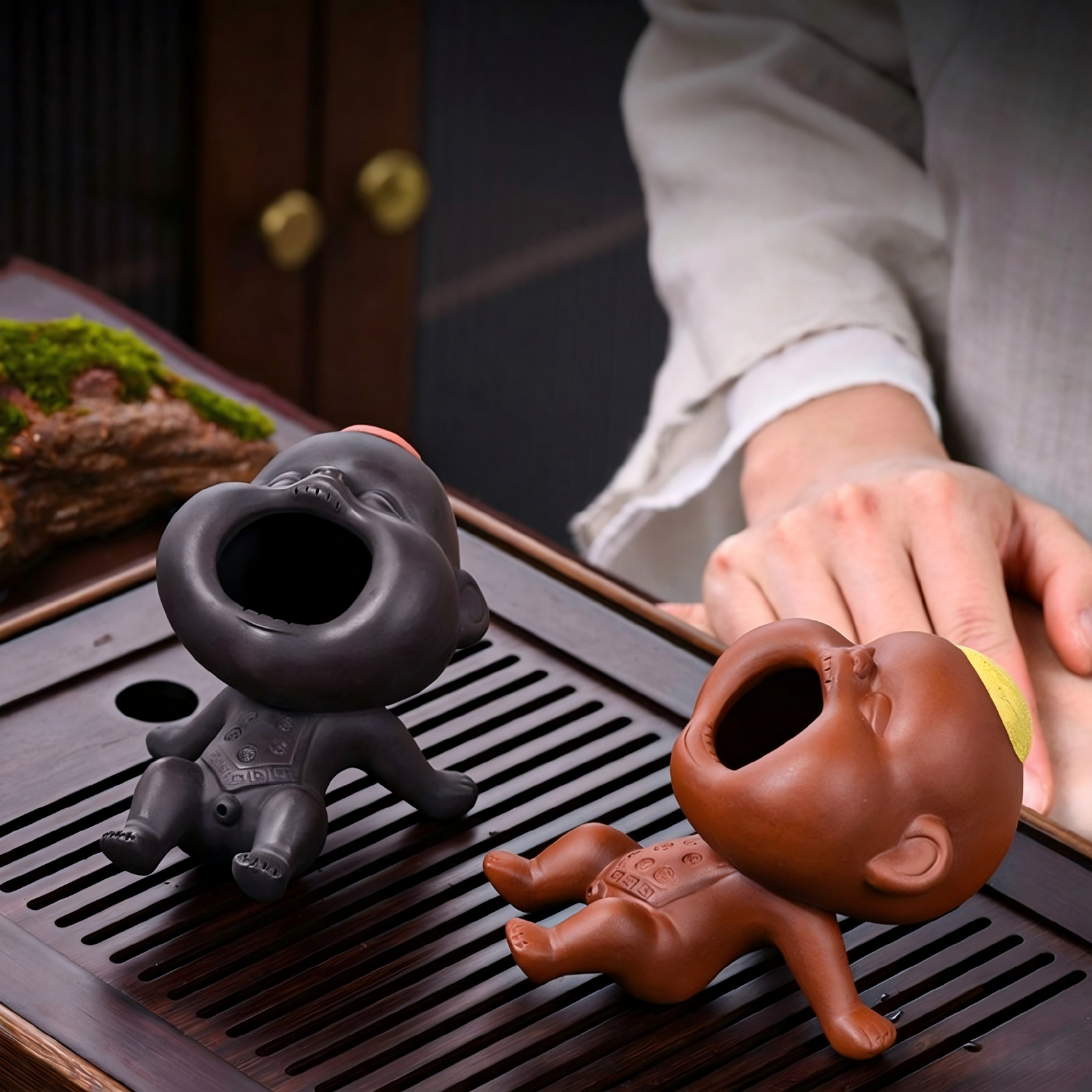 Artisan Zisha clay figurine pair ready for a mindfulness gongfu tea session