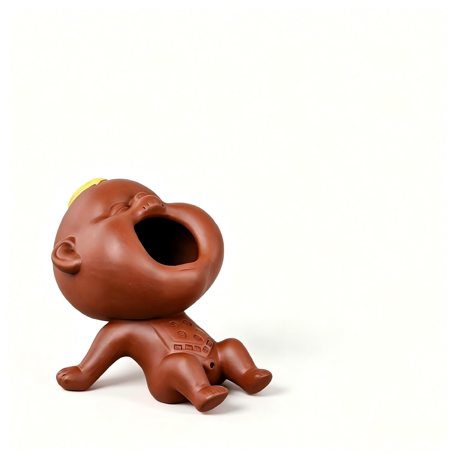 The Giggling Stream water-spitting tea pet in traditional red Zhu Ni clay