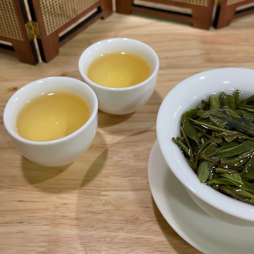 white peony tea brewed in teapot with light golden color