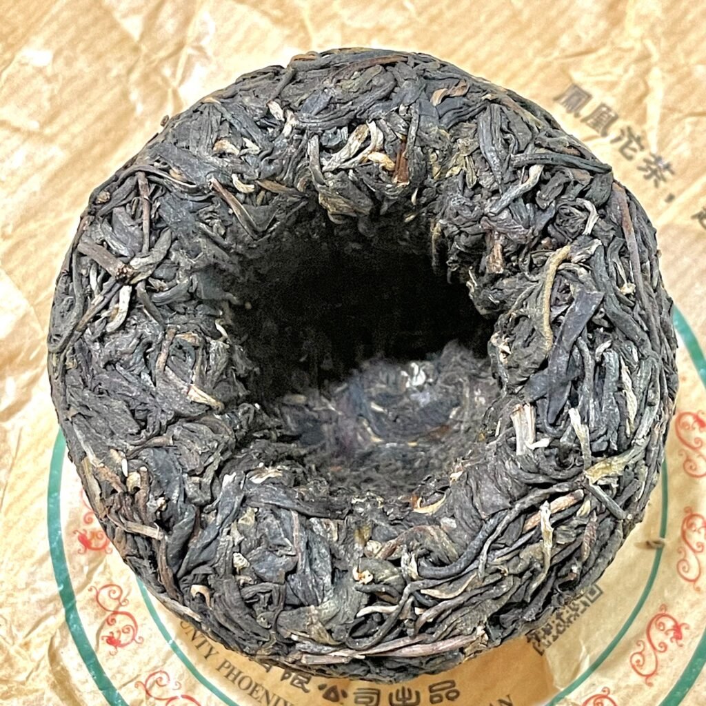 2023 Phoenix Mountain Raw Puerh Tuocha close up