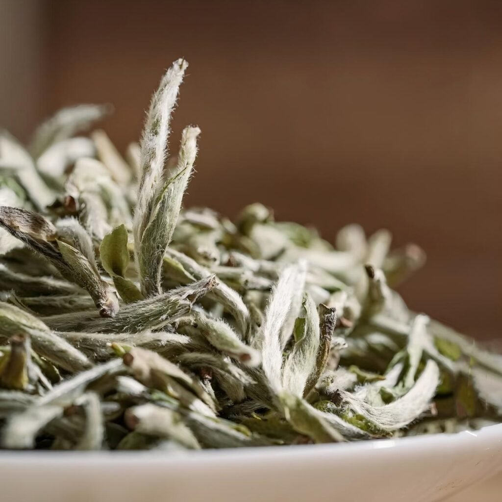 Premium white tea whole leaves, which are perfect for a naturally sweet cold brew iced tea.