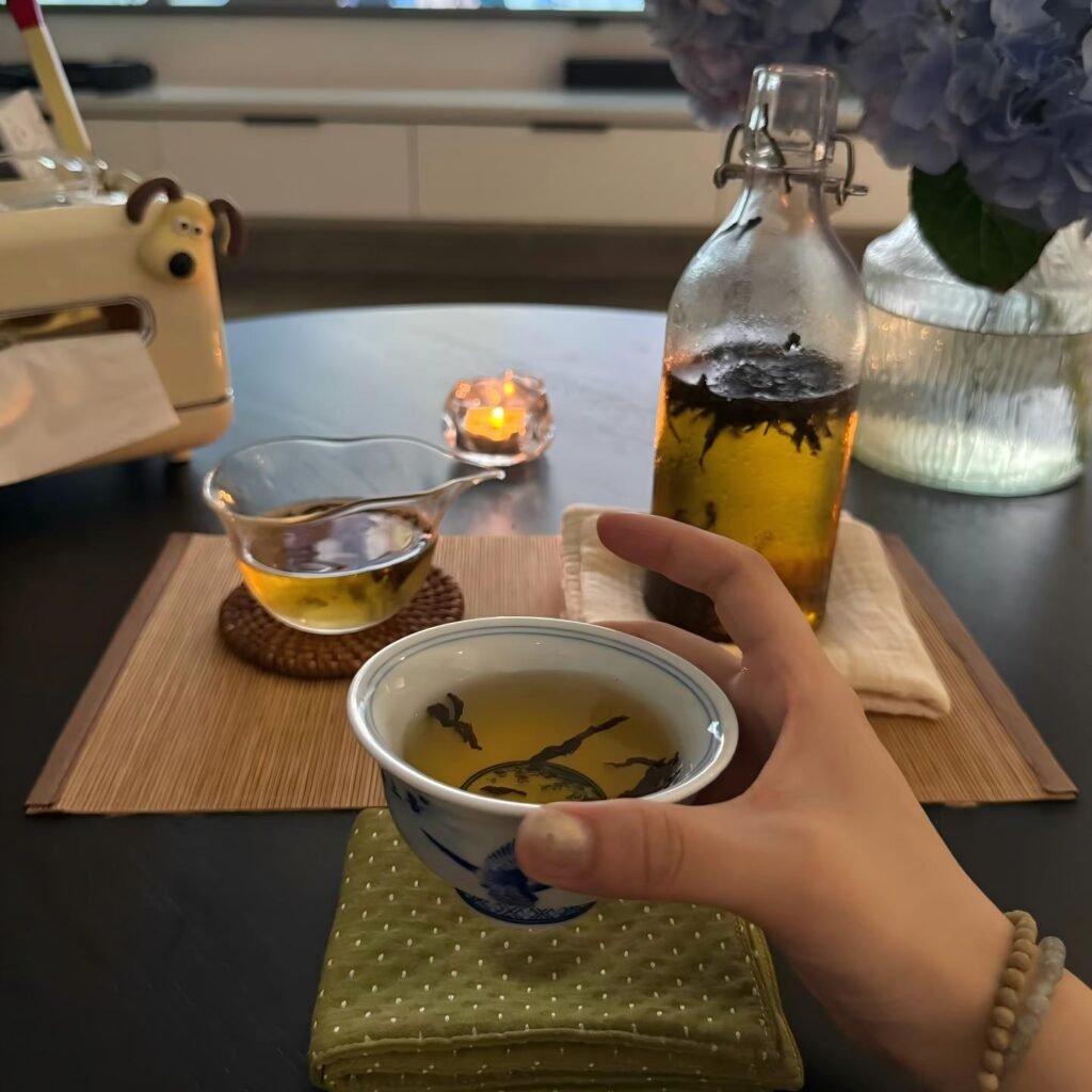 Enjoying a refreshing and healthy glass of cold brew loose leaf tea on a warm summer day.